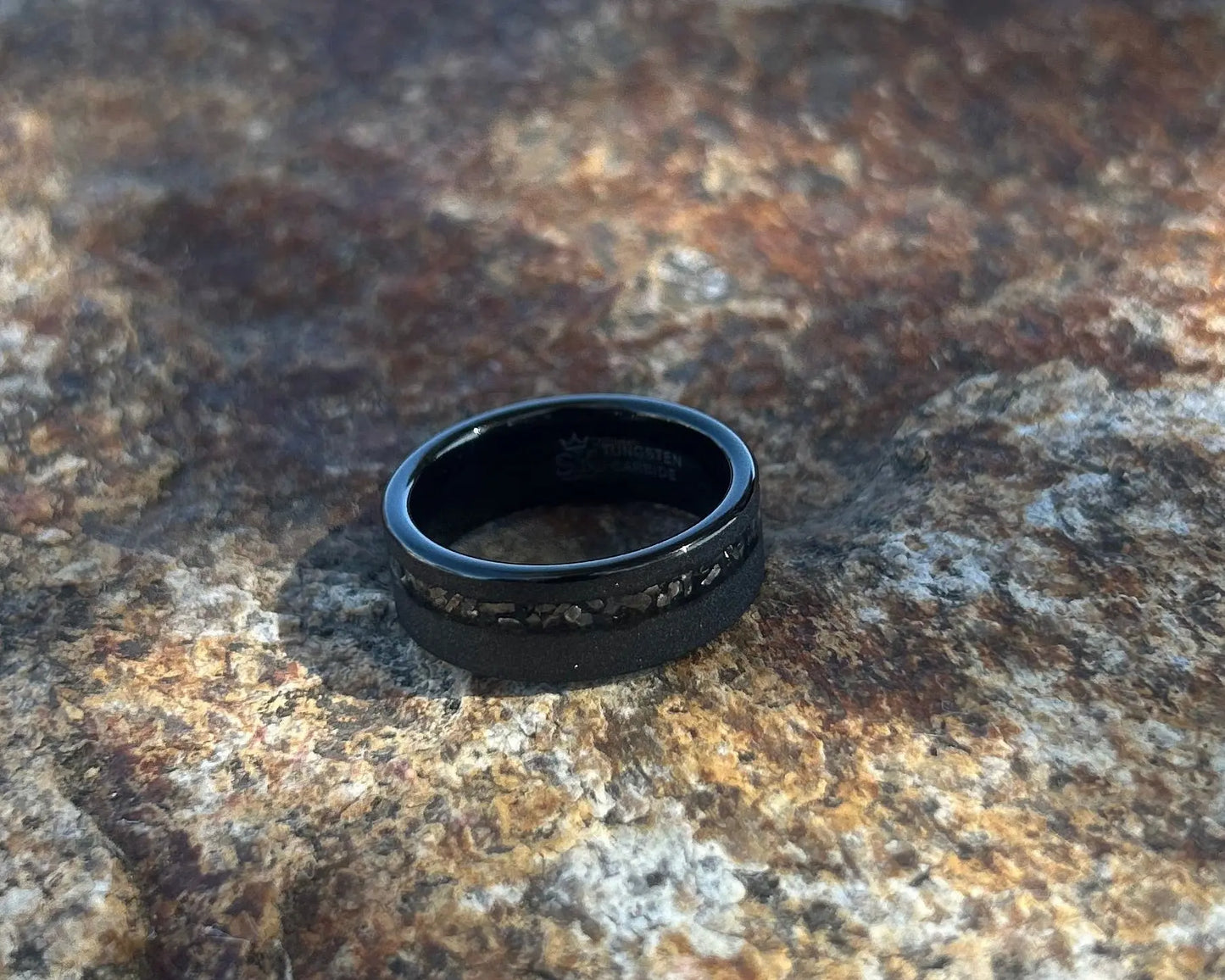 Cosmos ring meteorite inlay on textured rock
