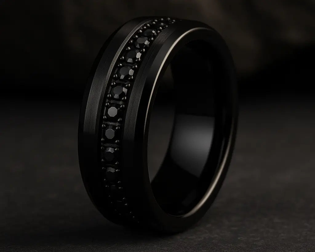 Black ring with embedded stones on a dark background